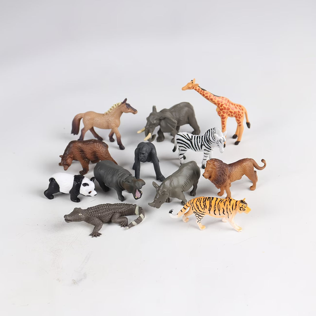 set 12 miniature animal figurines including